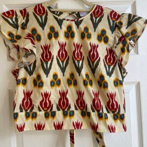 Backless blouse by RED Valentino